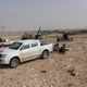 Similar Toyota pickups being used by militants in Libya.